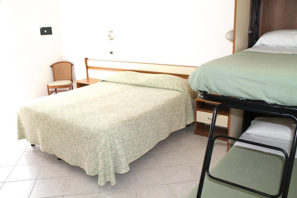 Hotel I 4 Assi Viareggio Pokoj fotografie